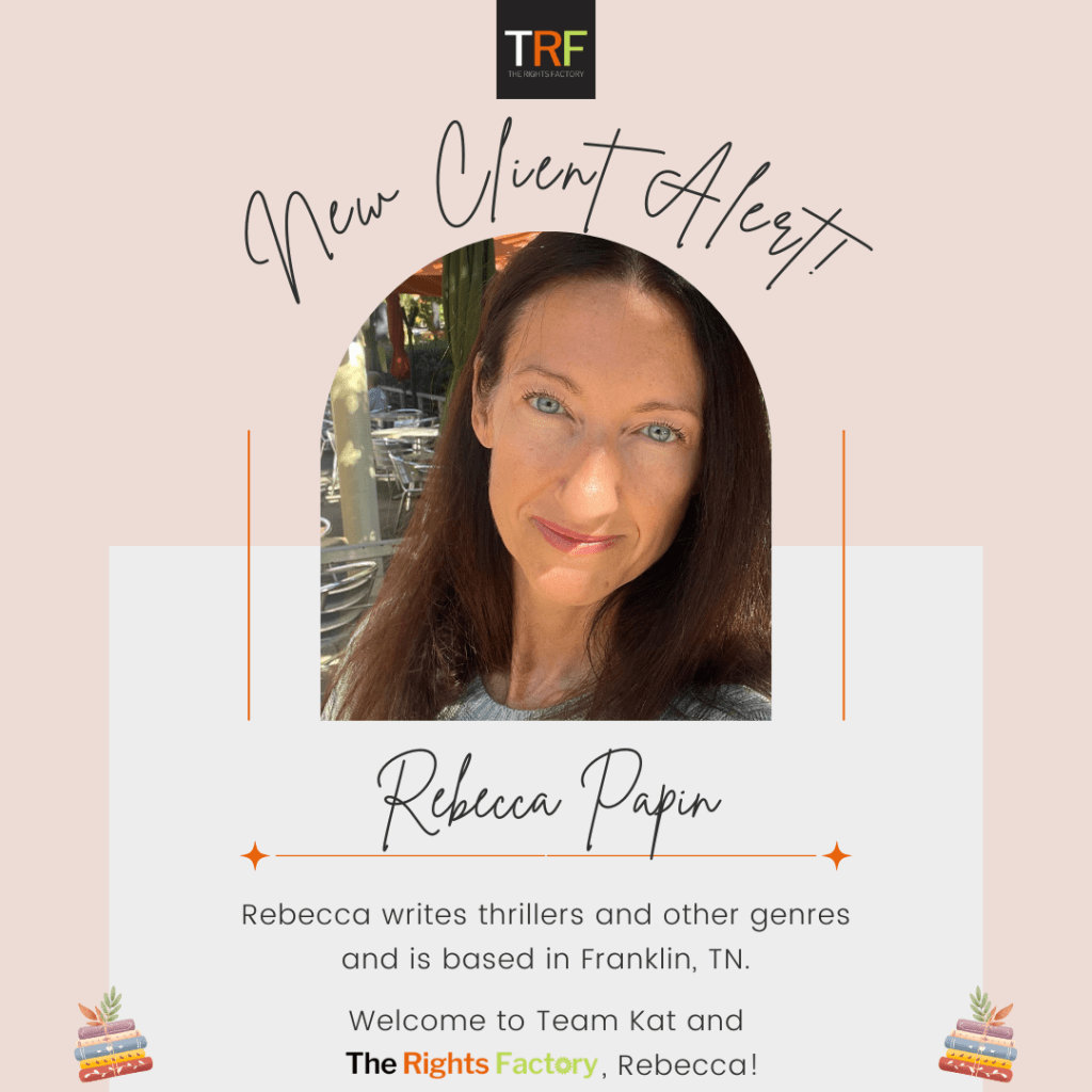 A peachy-coloured background. The Rights Factory logo at the top middle (small black square with TRF letters in white, red, and neon green).Curved Handwriting text: New Client Alert! A photo of Rebecca Papin, a light-skinned woman with auburn hair and bright blue eyes, smiling and looking directly at the camera, with sun on part of her face. Text: Handwriting, Rebecca Papin. Regular font, Rebecca writes thrillers and other genres and is based in Franklin, TN. Welcome to Team Kat, Rebecca! A small graphic of colourful stacks of books is on either side, tilted inward, at the bottom.