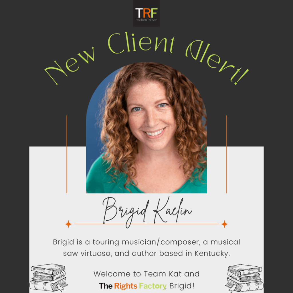 A charcoal-coloured background. The Rights Factory logo at the top middle (small black square with TRF letters in white, red, and neon green). Curved text: New Client Alert! A photo of Brigid Kaelin, a light-skinned woman with curly red hair and blue eyes, smiling with teeth, looking directly at the camera, wearing a bright green shirt. Text: Handwriting, Brigid Kaelin. Regular font, Brigid is a touring musician/composer, musical saw virtuoso, and author based in Kentucky. Welcome to Team Kat, Brigid! A small black graphic of stacks of books is on either side, at the bottom of the graphic.